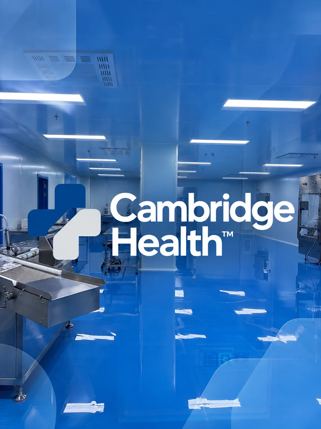 Cambridge Health production room with stainless steel equipment and blue flooring